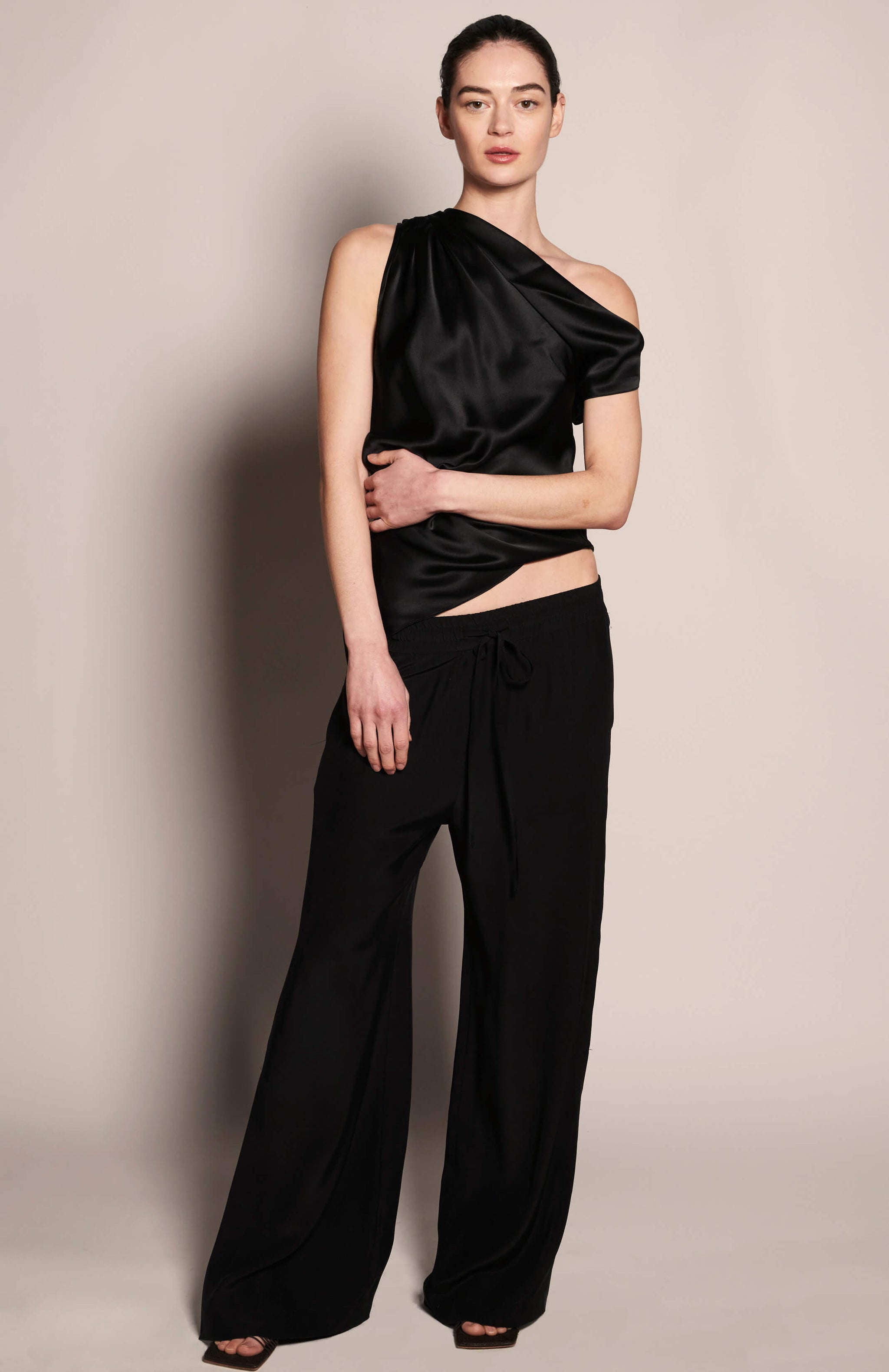 Black asymmetric one shoulder top store