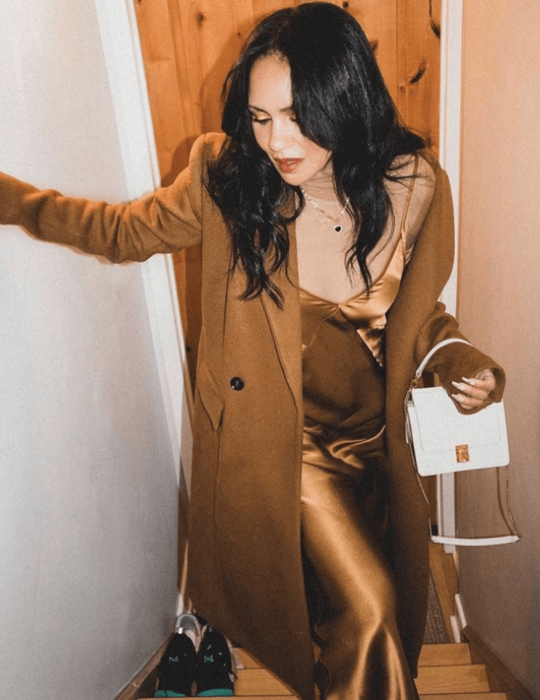 Taye Hansberry wearing KES Triangle Slip Dres, Superfine Turtleneck & Dionysus Coat